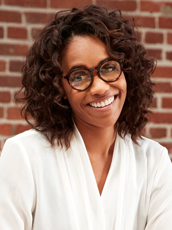 businesswoman-standing-and-leading-office-meeting-s-VDNP63K