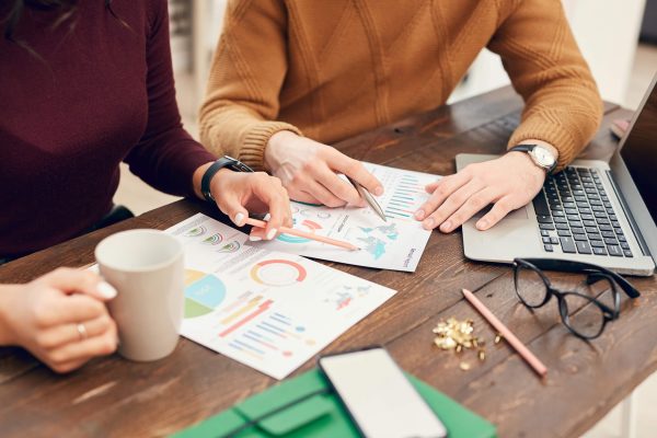 young-business-people-in-meeting-closeup-8RQ4TJR