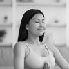 morning-yoga-portrait-of-calm-young-asian-woman-me-EHJKVZM