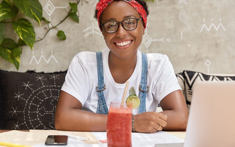 image-of-pretty-joyful-black-woman-has-online-Q5PUC74