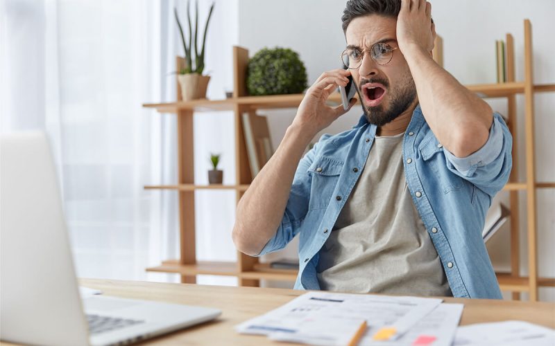 terrified-dissatisfied-bearded-man-looks-in-terror-KRZUV27